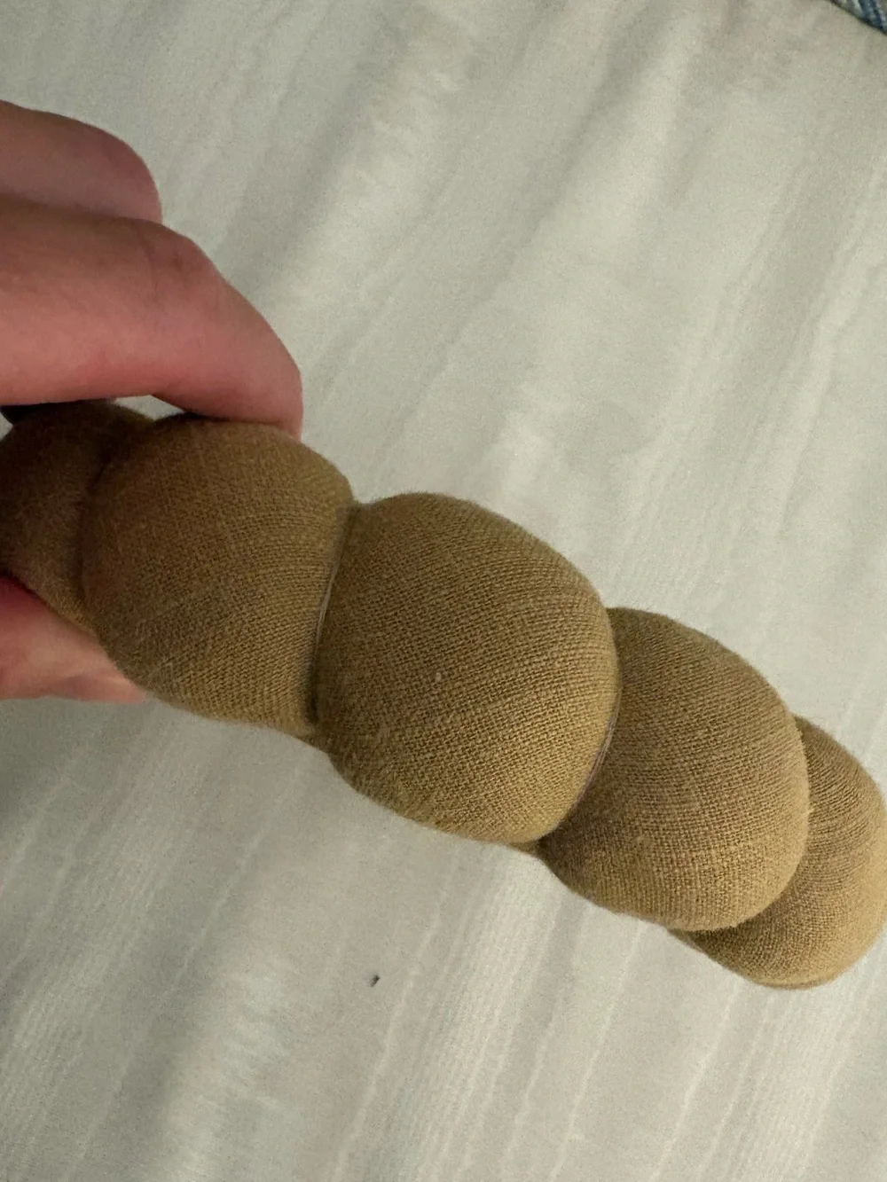 Versed croissant style tan linen headband